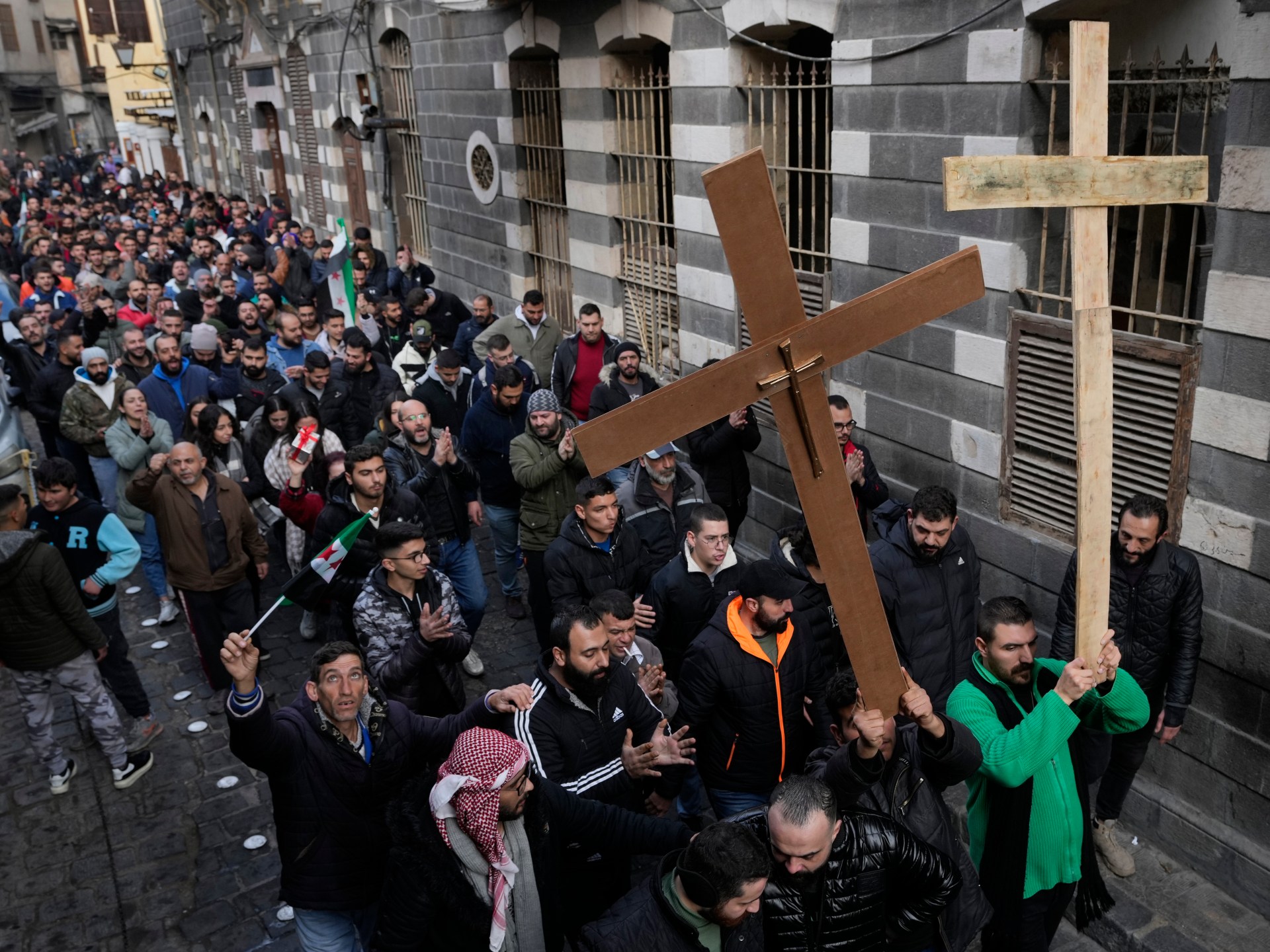 Protests in Syria after ‘old’ video shows attack on Alawite shrine | Syria’s War News