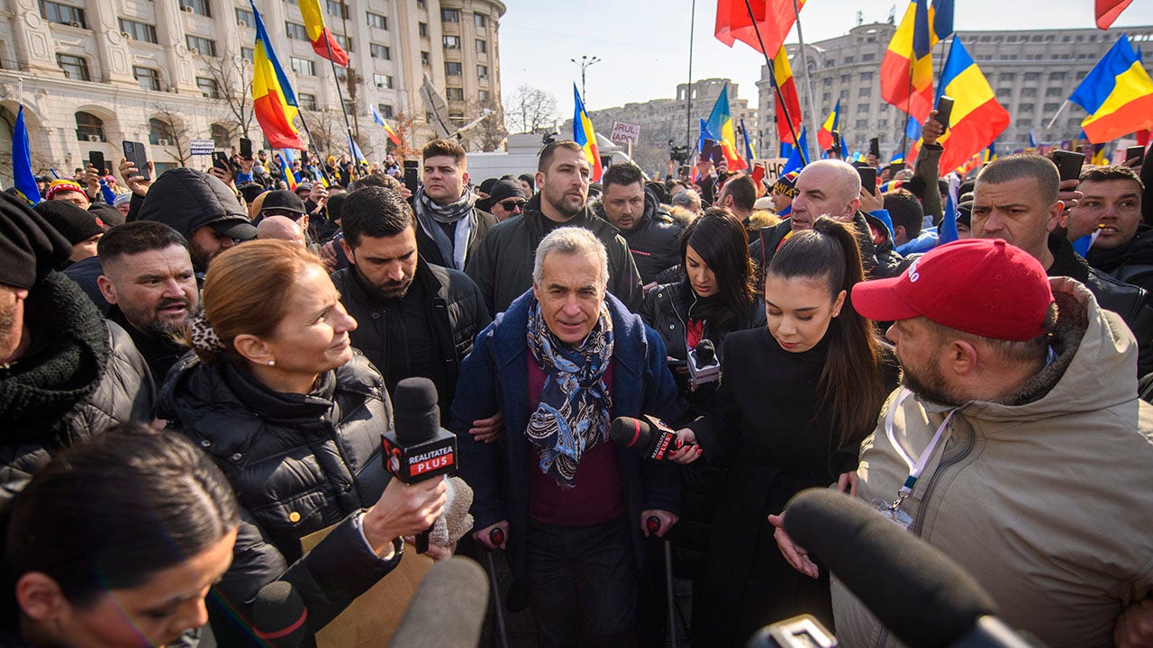 Frontrunner in Romania’s annulled presidential election barred from race