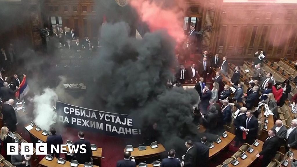 Serbia’s opposition under fire for smoke and flare protest in parliament