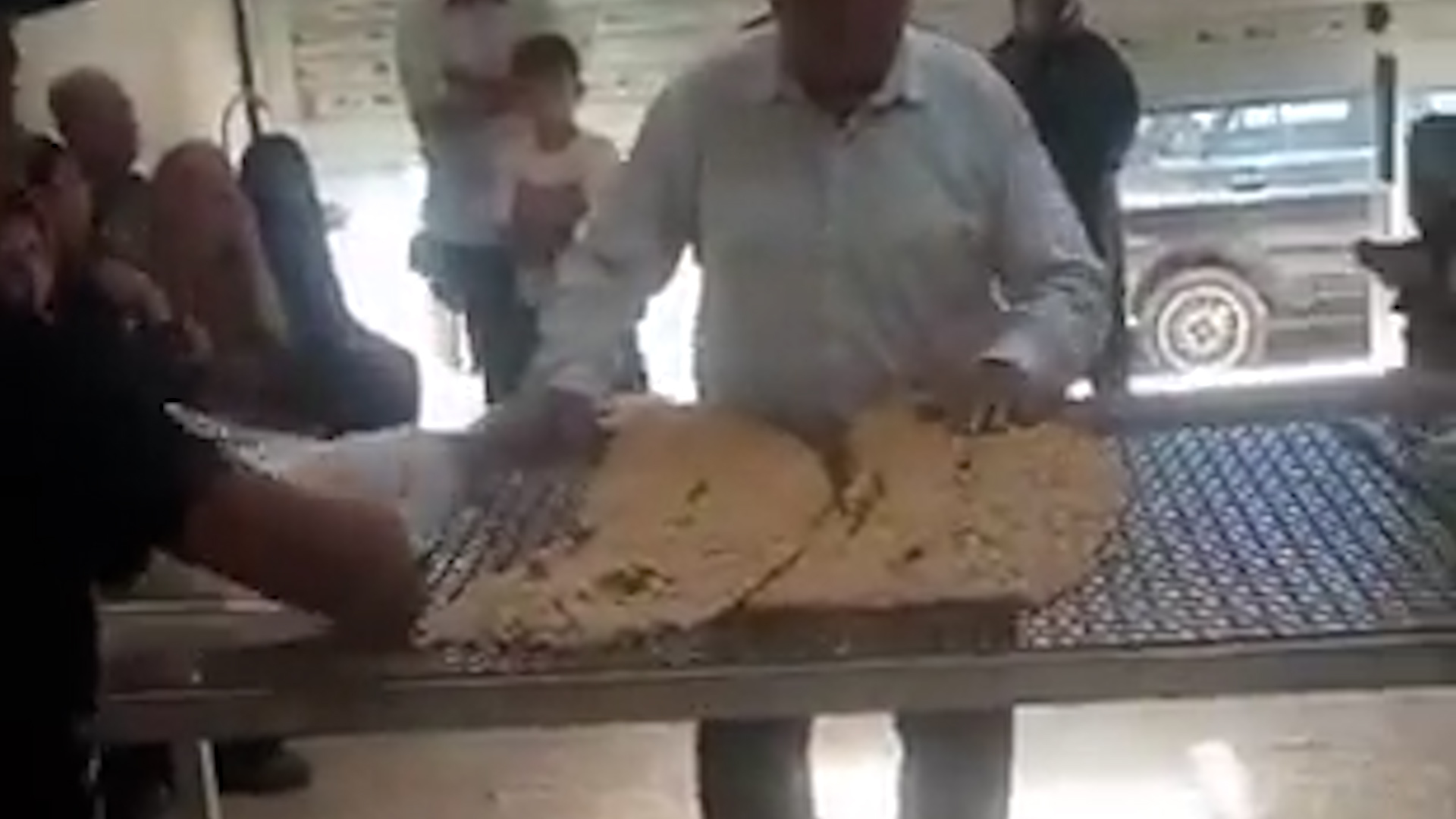 Video: Iranian baker keeps working after learning brother killed by Israel